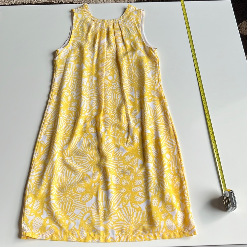 H&M dress floral design, pleats around neck front, Vneck cut, ties at the back